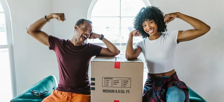 two people with a box