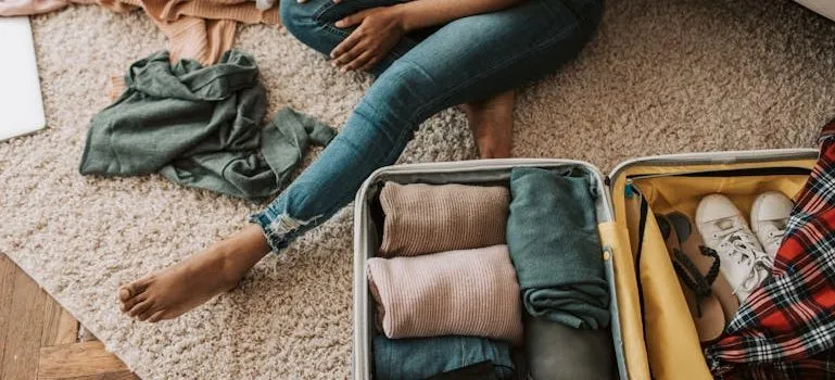person packing lightly