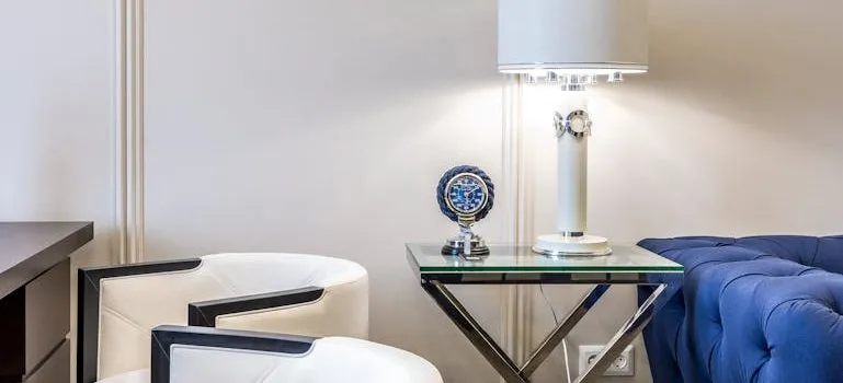 Lamp on small table in room