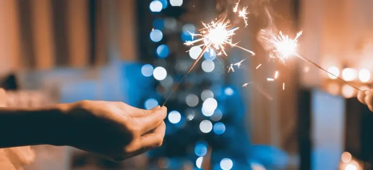 Two Person Holding Sparklers