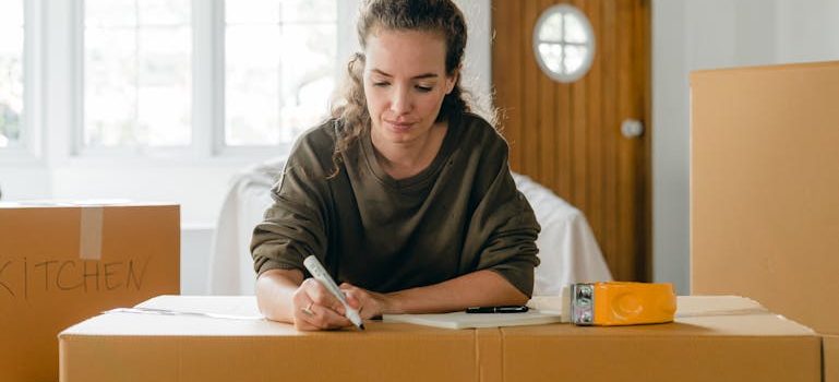 a woman writing about Avoiding common packing mistakes