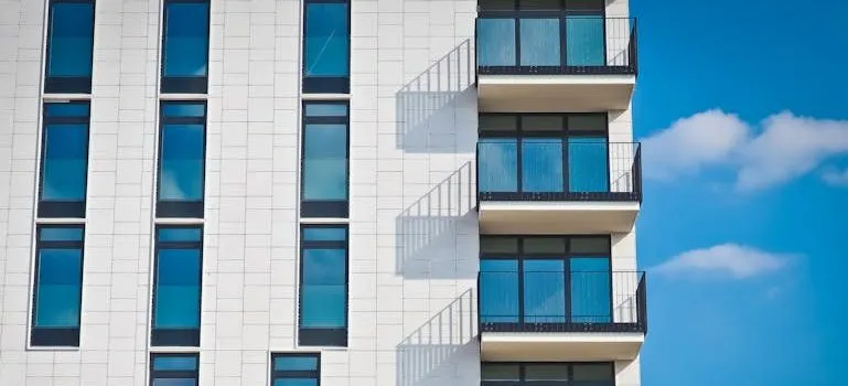 Low-angle Photography of Gray Concrete Building