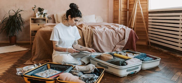 a woman reading about Staying organized during a long-distance move