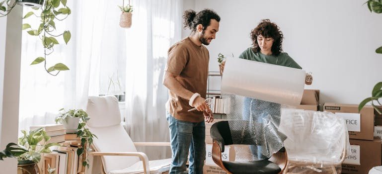 Couple Wrapping A Chair