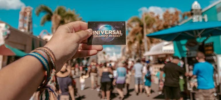 Person Holding Universal Studios Ticket