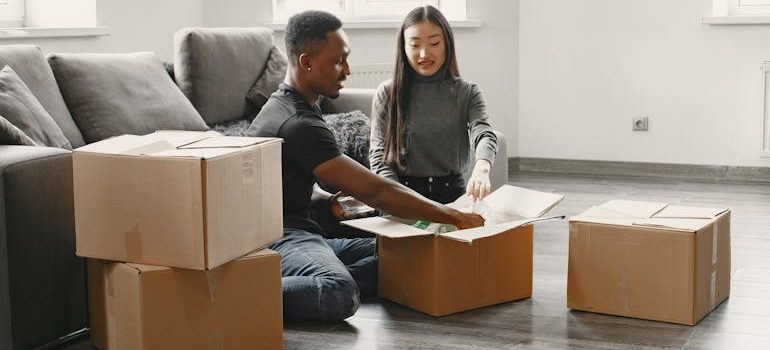 a couple talking about What to do before the movers arrive