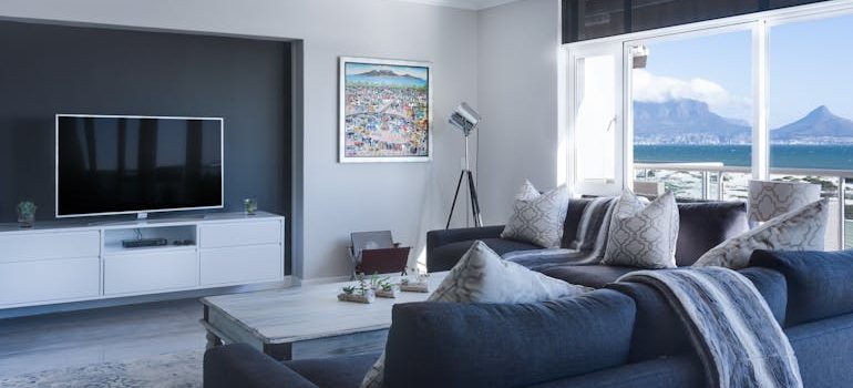 The best packing supplies for every room with blue sofa