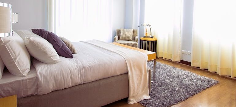 White Bed Comforter during Daytime