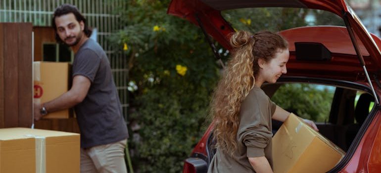 a couple thinking about Surviving your first move as a couple