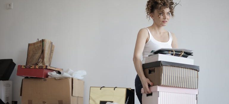 a woman thinking about moving day mistakes you’ll only make once