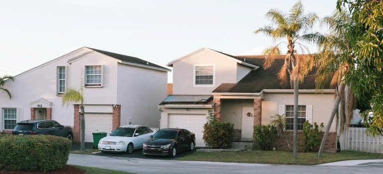Suburban Neighborhood with Palm Trees at Sunset